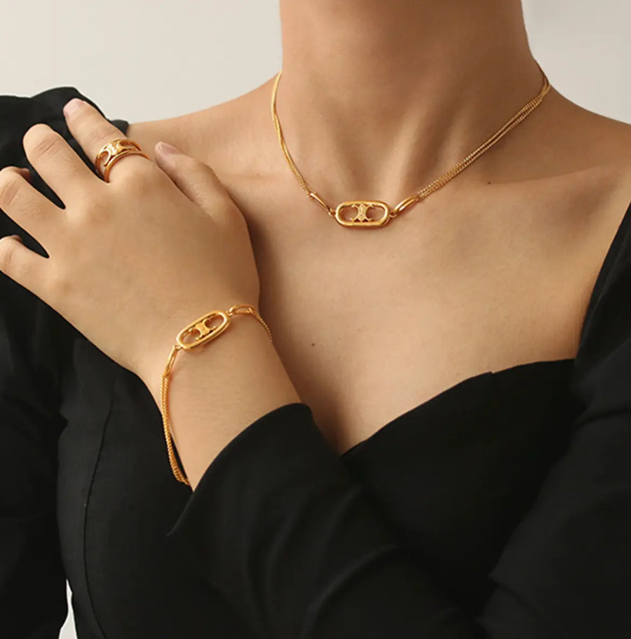 Aruary Studio ｜ Artisanal Jewelry CELI Triumph Arch Necklace & Bracelet Set | Gold-Plated Minimalist Jewelry | Geometric Twist Detail