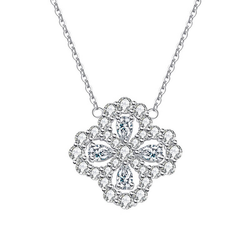 A luxurious 925 sterling silver four-leaf clover halo necklace featuring complex marquise-cut and round brilliant pave moissanite stones, rhodium plated for a white gold luxury finish.