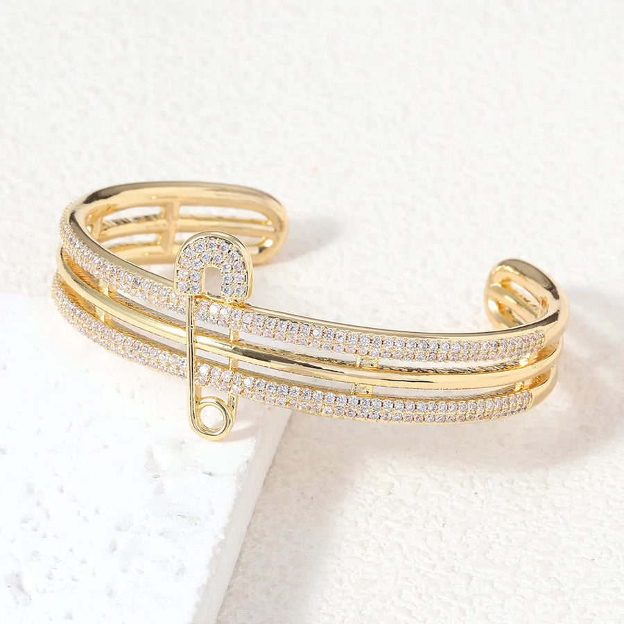 Aruary Studio ｜ Artisanal Jewelry Rebel Luxe Safety Pin Bangle | Oversized Cuff Bracelet | Asymmetric Cubic Zirconia Jewelry Golden