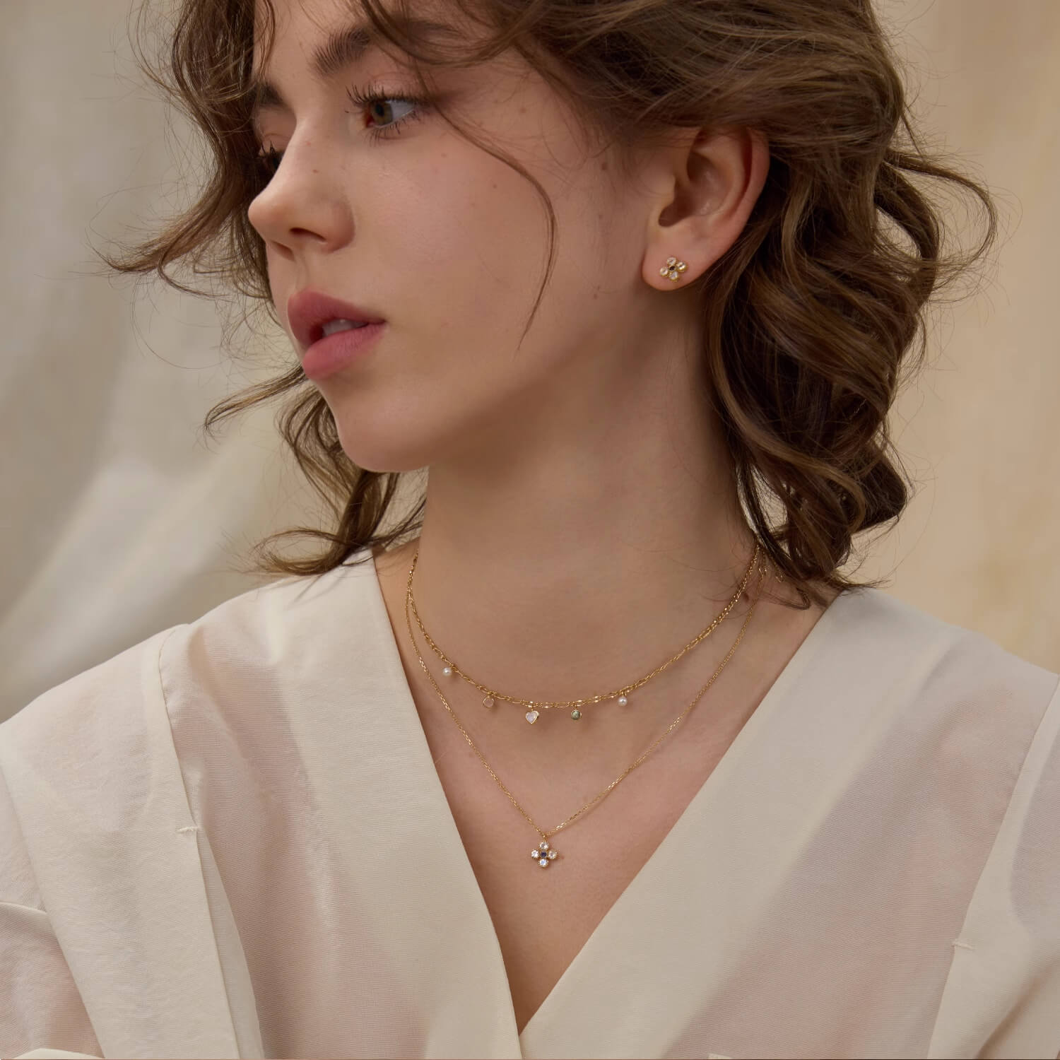 Close-up of a model wearing a gold dainty heart choker necklace, demonstrating the adjustable 37cm to 45cm length.