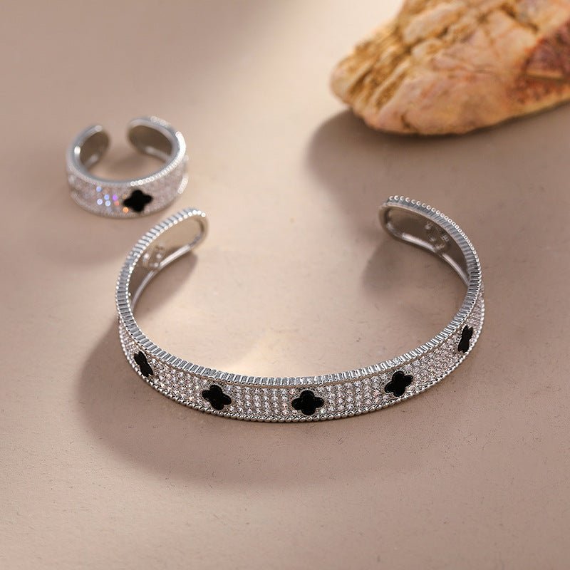 Titanium Steel Gold - Plated Open Cuff Bracelet with Black Clover & Micro - Paved Zircons - Aruary Studio ｜ Artisanal Jewelry