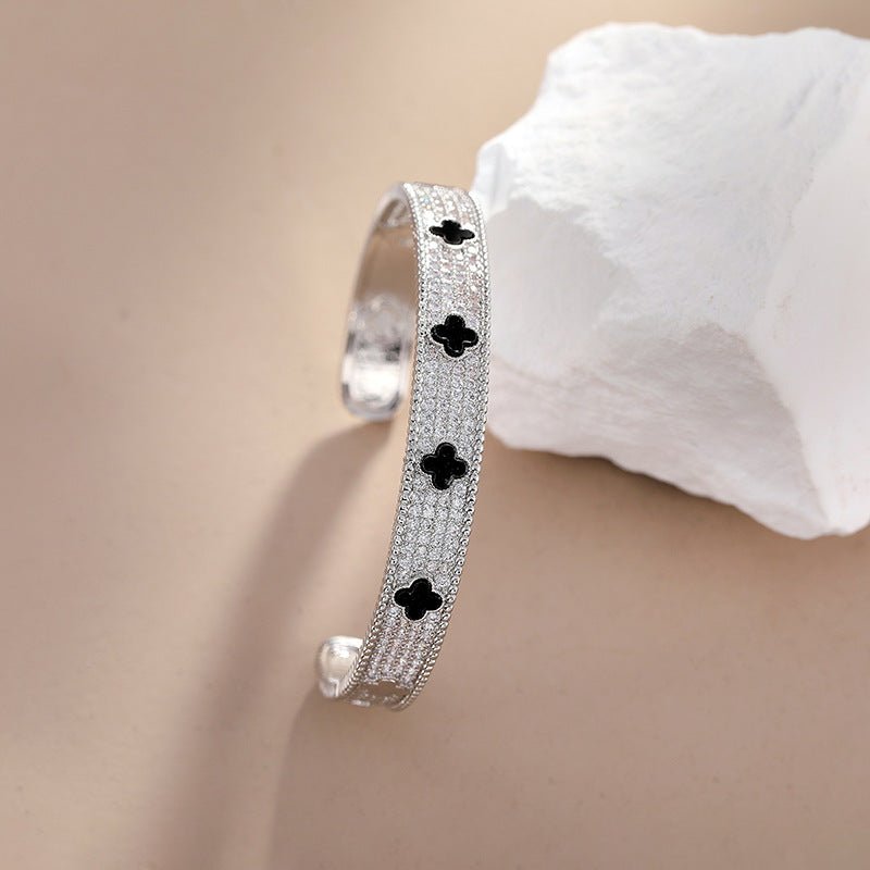 Titanium Steel Gold - Plated Open Cuff Bracelet with Black Clover & Micro - Paved Zircons - Aruary Studio ｜ Artisanal Jewelry