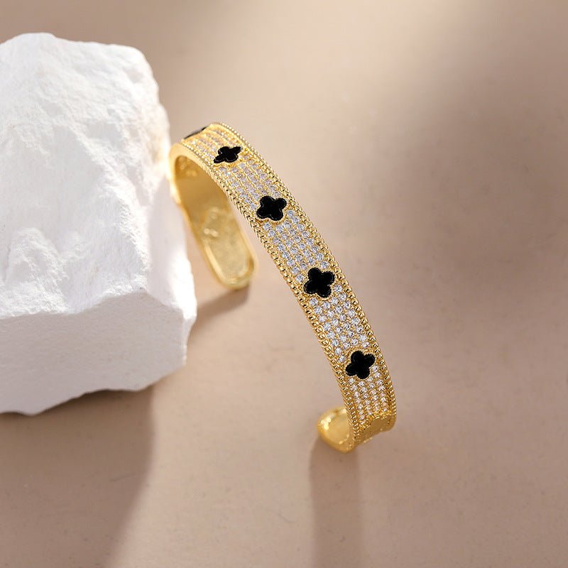 Titanium Steel Gold - Plated Open Cuff Bracelet with Black Clover & Micro - Paved Zircons - Aruary Studio ｜ Artisanal Jewelry